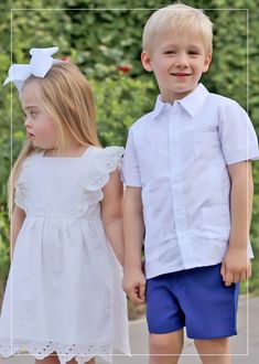 Don't forget to pack this Solid White Guayabera for your next resort vacation this summer or Cinco de Mayo celebration! It features four front pockets and pleated details. Personalize this Guayabera for your toddler boy or big kid by adding a monogram. Summer School Sets With Short Sleeves, Solid Summer Shirt For School, Short Sleeve Tops For Summer Baptism, Classic Short Sleeve Sets For Spring, Collared Shirt For School In Summer, Collared Summer Shirt For School, Spring Baptism Short Sleeve Sets, White Sets With Pockets And Short Sleeves, White Short Sleeve School Sets