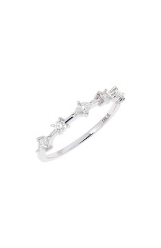 Marquise and round diamonds lend icy sparkle this stackable, handcrafted ring of 18-karat white gold. 1/8" band width, 1/8" setting Total diamond weight: 0.24ct. Color: G–H Clarity: VS 18k gold/diamond Imported >Diamond Guide Dazzling Half Eternity Ring, Diamond Stackable Rings Fine Jewelry, Crystal Ring With Diamond Accents On Round Band, Diamond Stackable Rings In Fine Jewelry Style, Stackable Diamond White Round Cut Diamond Ring, Stackable Round Cut Diamond White Diamond Ring, Moissanite Stackable Diamond Ring In Fine Jewelry Style, Stackable Diamond White Diamond Ring With Round Cut, Luxury Silver Stackable Rings With Brilliant Cut