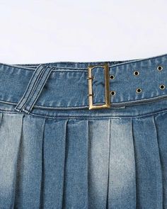 Details: Denim skirt with pleated design and belt detailsSkirt Length: ShortMaterials:75% Cotton + 25% Polyester High Rise Bottoms With Belt For Spring, Pleated Denim Blue Denim Bottoms, Belted Medium Wash Bottoms For Summer, Pleated Denim Blue Bottoms, High Waist Pleated Denim Skirt In Blue, High Waist Pleated Denim Blue Denim Skirt, Spring Medium Wash Belted Bottoms, High Waist Pleated Denim Blue Skirt, Trendy Medium Wash Skirt With Belt Loops