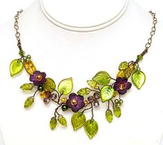 Flower necklace for women in purple adds a pretty pop of color to your attire.  Add a touch of romance for the bride, bridesmaids or the prom queen.  The flowers and vines in my garden were the inspiration for the beautiful piece of wearable art. Details: * Length 17-20 inches (length includes chain extension) * Bronze colored copper wires * Natural brass non-tarnish chain * Handmade hook clasp * Czech Glass Beads and Austrian crystals Please note the shape and style of beads may change dependin Necklaces Purple, Green Necklaces, Purple Jewellery, Botanical Necklace, Vine Necklace, Purple Flower Necklace, Vine Jewelry, Necklaces Wedding, Boho Wedding Jewelry