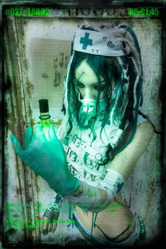 a woman with green hair wearing gloves and holding a bottle