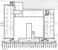 an architectural drawing shows the floor plan for a building with multiple floors and several windows