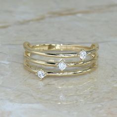 Special design, dainty fine jewelry for her. Handcrafted with love 🖤 and great care in my workshop at San Francisco Bay! The ring material is 14k solid gold, should not be confused with gold plating or filling. For highest quality, I'm using an advanced casting technology. The gemstones in this listing are high-quality cubic zirconia. I also work with moissanite and natural diamonds, please contact me for the details. They are delivered in a nice jewelry box and ready to be presented as a preci Dainty Fine Jewelry, Triple Band Ring, Gold Wrap Ring, Gold Wrap, Handmade Fine Jewelry, Jewelry For Her, Wrap Rings, Rings For Her, Unique Rings