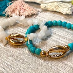 These Bracelets Are Nwt. Stretch Bracelets With Beaded Detail And Gold Toned Puka Shells. Perfect Condition. Super Cute! Turquoise Faceted Beads Bracelets For Beach, White Gemstone Beads Bracelets For Beach, Hand-strung Crystal Bracelet For Beach, Chunky Pearls, Double Wrap Bracelet, Pave Beads, Rose Bracelet, Puka Shell, Floral Bracelet