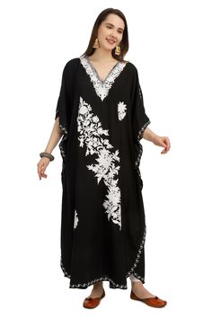 Kashmiri Aari Embroidered Cotton Kaftan.A Stunningly Marvellous Kaftan.This Kaftan Is Made Of Cotton Its Embroidered  With White Colour.Breezy Cotton Bohemian Maxi Dresses Or Caftans Are The Perfect Style Statement For Summer, Spring Days, Beach Holidays.The Embroidery Done On This Is A Traditional Kashmiri Embroidery Known As 'Aari Work''. Product Details - Condition: Brand New - Handmade - Style: Kaftan - Fabric: soft Cotton - Embroidery: Kashmiri Aari Embroidery - Length: 54'' Inch - Chest: 6 Traditional Embroidered Maxi Dress With Embroidered Neckline, Traditional Maxi Length Embroidered Dress, Traditional Maxi Dress With Embroidered Neckline, Traditional V-neck Dress With Embroidered Neckline, Bohemian Dresses With Dabka Work, Intricately Embroidered Beach Kaftan For Spring, Maxi Length Dress With Chikankari Embroidery For Navratri, Spring Beach Kaftan With Intricate Embroidery, Traditional Embroidered V-neck Dress For Eid