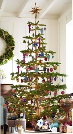 a decorated christmas tree in a living room