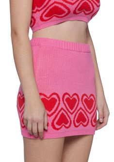 cuz hugs and kisses! This mini skirt has a knit construction, a heart print hem, and an elastic waistband. Trendy Mini Pink Bottoms, Trendy Pink Mini Bottoms, Playful Pink Mini Skort, Pink Fitted Cute Skort, Pink Heart Print Bottoms For Spring, Cute Stretch Pink Skirt, Cute Stretch Mini Skirt, Trendy Pink Heart Print Bottoms, Trendy Pink Bottoms With Heart Print