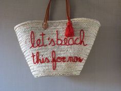 "personalize your beach bag basket with your names/words FREE STANDARD SHIPPING TO USA EUROPE AND CANADA for all my items 20% DISCOUNT for 5 or more bags hand embroidered by me and personalised with your name, initiails, words of your choise You can choose different colours for your writing SPECIAL PRICE FOR WHOLESALE OR BRIDE PARTY MORE PERSONALIZED BAGS IN MY SHOP: https://www.etsy.com/your/shops/StrawBasketsMorocco/tools/listings/section:24635994 HANDLES : ♧long leather handles ♧short straw h Embroidered Natural Straw Bag For Beach, Embroidered Beach Straw Tote Bag, Embroidered Natural Straw Beach Bag, Summer Embroidered Beach Bag, Embroidered Tote Beach Bag For Shopping, Bachelorette Bag, Custom Beach Bags, Braided Bag, Straw Tote