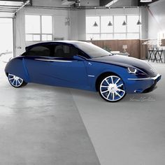 a blue car is parked in an empty garage