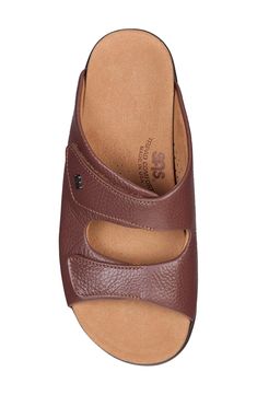 This slide sandal has an incredibly cushioned microfiber footbed that contours to the natural shape of the foot, while a comfort sole rebounds with each step. Adjustable hook-and-loop straps Cushioned footbed with arch support Shock-absorbing sole Leather upper/textile lining/synthetic sole Made in the USA Brown Slides With Ortholite Insole And Round Toe, Comfortable Brown Slides With Arch Support, Comfortable Open Toe Slippers With Removable Insole, Comfortable Open-toe Slippers With Ortholite Insole, Brown Slip-on Slides With Arch Support, Comfortable Closed Toe Slides With Removable Insole, Comfortable Open Toe Slippers With Ortholite Insole, Comfortable Brown Footbed Sandals With Arch Support, Brown Slides With Cushioned Footbed