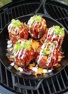 some food is sitting on top of a bbq grill and ready to be eaten