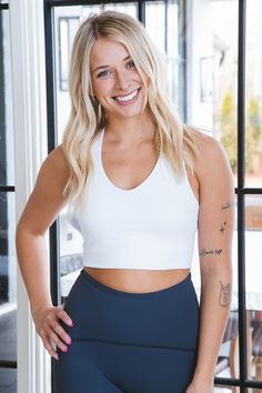 *EXCLUDED FROM ALL SALES + DISCOUNT CODES* This White Longline Sports Bra by SPANX is designed for maximum performance and support. The longline silhouette combined with a side seam detail provide a comfortable fit, while keeping you secure and supported during any activity. Enjoy superior motion control and optimal coverage with this must-have sports bra. General Info: 68% Nylon, 32% Elastane Longline Side Seam Detail Medium Impact Imported FIT GUIDE: Measured From Size Small Length: 12.5" Fit & Shape: Fitted Fabric texture: Super Soft Fabric elasticity: Stretch Fit Model Info: Height: 5’6” | Bust: 34” | Waist: 25” | Hip: 34” | Size Shown: Small White Sports Bra, Fabric Texture, Discount Codes, Clothing Company, Long A Line, Soft Fabric, Soft Fabrics, Must Haves, Fitness Models