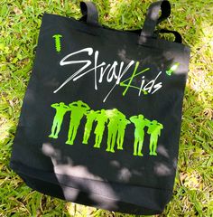 "Tote bag is inspired by Stray Kids latest comeback.  It is made with premium matte vinyl as well as with some holographic vinyl.   Color: Black  Dimensions: 15\" W x 16\" H with 20\" self fabric handles Tote is 100% cotton sheeting which makes it durable and last for years of usage.  3 in Bottom Gusset  Eco Friendly Shipping Instructions: - Our processing time is 3-5 business days. We Print and ship from Texas. Washing Instructions: - Please turn the tee inside out before washing - Warm machine Green Bags For Back To School Streetwear, Tote Bag Kpop, Kpop Tote Bag, Skz Outfits, Skz Merch, Stray Kids Oddinary, Stray Kids Maniac, Holographic Vinyl, Handmade Tote