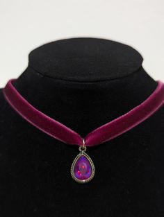 Velvet teardrop pearlescent pendant choker necklace. Necklace is 14 inches in length with a silver tone 2-inch chain extension. Ordering instructions: For the burgandy/wine color select, "Red". For the hot pink color, select "pink". Jewellery Board, Pink Pendant, Velvet Pink, Pendant Choker Necklace, Hot Pink Color, Pendant Choker, Jewelry Boards, Wine Color, Necklace Necklace