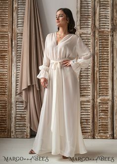 Elegant V-neck Robe For Evening, Elegant V-neck Bridal Dress, Chic Satin Finish Wedding Maxi Dress, Chic Satin Finish Maxi Dress For Wedding, Chic Satin Maxi Dress For Wedding, Elegant V-neck Gown For Wedding Night, Silk V-neck Gown For Wedding Night, Wedding Maxi Dress With Satin Finish, Elegant Silk Wedding Night Gown