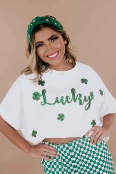 Introducing the Lucky Sequin Patch Top in White, a stunning addition to your St. Patrick's Day wardrobe! This eye-catching top features a white fabric adorned with a shimmering sequin patch in the shape of a lucky charm. The sequin patch adds a touch of sparkle and whimsy to your outfit, making it perfect for celebrating the holiday in style. Sequin patched top Lucky sequin patch Oversized top White + Green sequin detailing throughout Dolman sleeve 100% Cotton Imported Model Specs: Emily is wearing a size small in the photo.How will this item fit you? Check out our MODEL SPECS (Typical Sizing - Karli: S-Size 5/26 - 5ft 2in, Emily: S-Size 3/25 - 5ft 5in, Syd: L/XL- Size 15/ - 5ft 8in)﻿Need help with sizing? No problem! Join our VIP group on Facebook, Everyday Chic Boutique VIP Insiders to c St Pattys Day Outfit, San Patrick, Patch Top, Sequin Patch, Peach Love, Vip Group, Everyday Chic, Green Sequins, Outfit Making