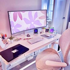 a desk with a computer, keyboard and mouse on it