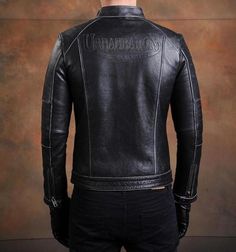 Genuine leather, cafe-style jacket Slide that swagger on from the not-so-bygone days of the Ace Café, where cafe racing culture started when the Rocker and "Ton-Up Boys" were raising hell in London with their modified customs. This handsome cowhide leather biker jacket is made by Urban Baron in the authentic style of a classic cafe racer jacket. It features a British flag patch, multiple zippers to carry your shit in, and a snap fastener for a stand up collar. SPECS Material: Genuine cowhide lea Streetwear Cafe Racer Leather Jacket, Streetwear Cafe Racer Leather Jacket With Long Sleeves, Cafe Racer Leather Jacket For Streetwear, Winter Streetwear Cafe Racer Leather Jacket, Cafe Racer Biker Jacket For Streetwear, Retro Leather Jacket For Biker Events In Winter, Cafe Racer Leather Outerwear For Streetwear, Leather Cafe Racer Jacket For Streetwear, Motorcycling Cafe Racer Leather Jacket With Long Sleeves