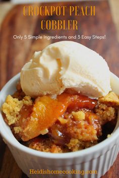 a close up of a bowl of food with ice cream on top and the words crockpot peach cobbler above it