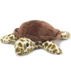 a stuffed turtle with a brown hat on it's head is shown in front of a white background