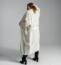 White cardigan Light coat Oversized cardigan Chunky sweater Basic clothing Chunky loose knitwear Long coat Minimal clothing Kimono cardiganOne size fits for XS-M/LFree shipping worldwideThis item can be made in any size and color (1-2 weeks for production). Contact us, and we will advice about color availability and measures required. The wool is machine washable with program of "wool" or "delicate" Low temp. 30°Designed & Created by Gurenkova Knitwear Oversized Beige Shawl Collar Outerwear, Oversized Open Front Winter Sweater, Oversized Open Front Sweater For Winter, Long Chunky Knit Sweater Coat For Winter, Oversized Long Outerwear In Winter White, Long Chunky Knit Winter Sweater Coat, Oversized Cozy Sweater Coat For Winter, Oversized Long Sweater Coat For Winter, Cozy Open Front Sweater Coat For Winter