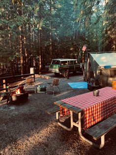 an rv park with picnic tables and campers