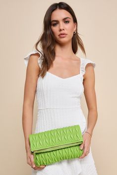 The trendiest 'fit deserves the most fashion-forward finishing touch, like the Demeter Lime Green Vegan Leather Quilted Clutch! Smooth vegan leather shapes this puffy, quilted-style clutch that features a classic foldover silhouette with hidden magnetic closures that open to reveal a roomy outer pouch. Unzip the top to access an interior compartment with a sidewall zippered pocket and two bonus sidewall slots. Carry as a chic clutch or attach the removable gold chain strap for a crossbody look! Quilted Clutch, Vegan Handbags, Wedding Top, Casual Wedding Dress, Spring Shoes, Clutch Handbag, Vegan Friendly, Chain Strap, Lime Green