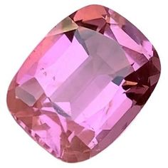 an oval shaped pink diamond on a white background