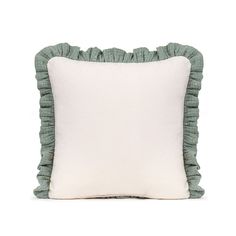 a white and blue pillow with ruffles on the front, against a white background