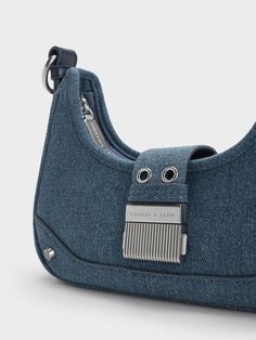 This product is made with at least 20% sustainable materials by weight. CHARLES & KEITH uses recycled, degradable, organic, and water-based materials in our eco-conscious collection. From the tactile denim finish to the Y2K-inspired hobo silhouette, this iteration of our Winslet bag will bring a touch of casual-chic to your everyday outfits. Complete with silver-toned hardware, the denim-and-silver combination creates a youthful and effortlessly cool aesthetic that will easily be the focal point of your look. This bag comes with two detachable straps so you can easily switch up your carrying style depending on your mood and look. Cool Aesthetic, Denim Belt, Silver Pumps, Brand Collaboration, Faux Leather Heels, Size Chart For Kids, Kitten Heel Pumps, Charles Keith, Heel Pumps