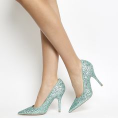 Elevate your style with our Cyan Sparkly Heels. These glittery pointy toe stiletto heels will add a touch of glamour and sophistication to any outfit. Handcrafted US sizing. Fits true to size. Heel Height: 4" / 100 mm approx Product measurements were taken using size 8. Please note that measurements may vary by size. Glamorous Green High Heels, Fitted High Heel Sequin Heels, Glamorous Fitted Green Heels, Chic Turquoise Heels For Evening, Elegant Turquoise Heels For Party, Glamorous Pointed Toe Court Shoes For Events, Elegant Turquoise Evening Heels, Elegant Turquoise Party Heels, Chic Turquoise Pointed Toe Heels