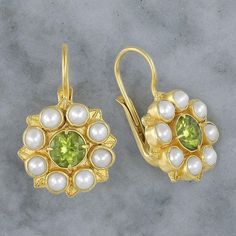 We believe that every element of an earring should be beautiful. A flower of emerald and pearls is accented with filigreed leaves in this Elizabeth floral design. 24k gold over sterling silver. European backs for pierced ears. Size: 1 inch. Romantic Earrings, Sweet Accessories, Peridot Earrings, Party Earrings, Geometric Pendant, Pearl Types, Engagement Jewelry, Estilo Boho, Pierced Ears