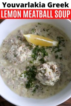 a white bowl filled with meatballs and lemon