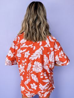 Get ready for a tropical adventure with our Let's Get Tropical Floral Top! Made with a button front, collared neckline and rounded hem, this top is perfect for all-day comfort. Pair with our matching Island Vacay Tropical Floral Shorts for the ultimate island-inspired look. It's a match made in paradise! Collared neckline Button front Short sleeves Chest pocket Rounded hem Fit: Relaxed; No stretch Bust: Small-46in Medium-48in Large-50in Length: Small-28in Medium-29in Large-30in Fabric: 80% Rayon Hawaiian V-neck Top With Tropical Print, Vacation Tops With Button Closure And Camp Collar, Printed Blouse With Camp Collar For Vacation, Hawaiian Vacation Tops With Button Closure, Collared Tops With Hibiscus Print For Spring, Collared Hibiscus Print Top For Spring, Vacation Tropical Print Button-up Blouse, Vacation Button-up Blouse With Tropical Print, Hawaiian Printed Button-up Top