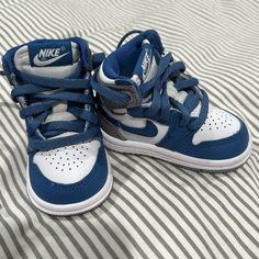 Never Worn Size 3c. Can Ship In Box But Not The Original Box. Sporty Blue Sneakers For Playtime, Sporty High-top Jordan Shoes For Playtime, Blue Sporty Sneakers For Playtime, Blue High-top Non-slip Sneakers, Nike Non-slip Blue Sneakers, Nike Blue Non-slip Sneakers, Casual Blue Sneakers For Playtime, White Nike Sneakers For Play, Nike White Sneakers For Playtime