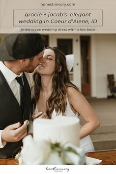 a bride and groom kissing in front of a wedding cake with the words grace + jacob's elegant wedding in court d'alene, id