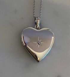 "Diamond Heart Locket in Sterling Silver, * 3/4 Inch Pendant * Holds 2 Photos * Solid 925 Sterling Silver, NOT Plated * Chain in 6 Lengths, 16\", 18\", 20\", 22\", 24\", 30\" * Gift for Women: Mother, Grandmother, Daughter, Sister, Wife, Friend * Rhodium Anti-Tarnish Coating * Comes in Gift Box with Velvet Pouch Thank you for visiting HarperSilver! 🎁Packaging: This item comes gently packaged in a fabric pouch housed inside of a silver foil linen box with a silver bow. It is ready to present as Luxury Sentimental Heart-shaped Jewelry, Cheap Silver Heart Locket Necklace, Affordable Silver Heart Locket Necklace, Cheap Silver Pendant Locket Necklace, Silver Locket Necklace Aesthetic, Affordable Silver Round Locket Necklace, Silver Heart Locket Necklace, Heart Locket Aesthetic, Sister Christmas Gift Ideas