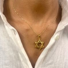 Star Of David Necklace made of Gold Vermeil: 18k Gold over Solid 925 Sterling Silver ☞ made to last. Matching Ring & Matching Earrings ☞ please ask me Details:• Dimensions: Pendant Height 32.5mm, Width 19.7mm• Free Complimentary Chain• 18k Gold Vermeil SKU TE-036 Gold Star Of David Jewelry For Anniversary, 14k Gold Star Of David Jewelry Gift, 14k Gold Star Of David Jewelry, Hallmarked 14k Gold Star Of David Jewelry, Star Of David Jewelry With Star Charm For Anniversary, Star Of David Yellow Gold Plated Jewelry, Star Of David Yellow Gold Jewelry Gift, Hallmarked Star Of David Jewelry For Gift, Spiritual Yellow Gold Star Jewelry