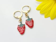 Gold Strawberry Earrings, Red Strawberry Foodie Dangle or Buggies Hoop Earrings, HOW TO ORDER 1) Select the quantity 2) Select style 3) Add to cart DESCRIPTION ♥ 18K Real gold plated stainless steel/brass ear hook 19-22mm. or 14.5x12mm hoop ♥ Zinc Base Alloy Enamel Pendants, Lead & Nickel Safe, approx. 10mm wide, 20mm long. ** Conversion: 1 inch = 25.4mm or 1mm = 0.0393 inches** ♥ All personalized is done by HAND. ♥ Raw materials the USA and international sourcing. ♥ I do not include invoice Red Enamel Hoop Earrings Gift, Red Enamel Hoop Earrings For Gifts, Red Hypoallergenic Dangle Hoop Earrings, Red Dangle Clip-on Earring, Red Dangle Single Clip-on Earring, Cute Red Enamel Earrings, Cute Red Dangle Jewelry, Red Huggie Hoop Earrings As Gift, Red Hoop Earrings For Gift