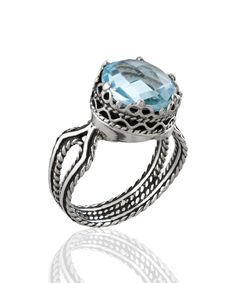 Looking for the perfect gift for your loved ones? Look no further than this stunning silver filigree art women's cocktail ring! With its intricate details and beautiful design, this ring is sure to make a lasting impression. Featuring a double-sided faceted checkerboard round-cut blue topaz gemstone that is 10mm in size and a 0.47"/12.00mm face width, this ring is simply gorgeous when worn. This stunning piece comes with a velvet pouch, silver polish cloth, and a luxurious gift box, making it th Birthday Gemstones, Red Topaz, Gorgeous Style, Blue Topaz Gemstone, Gorgeous Ring, Blue Stone Ring, Detailed Ring, Sterling Silver Filigree, Double Heart