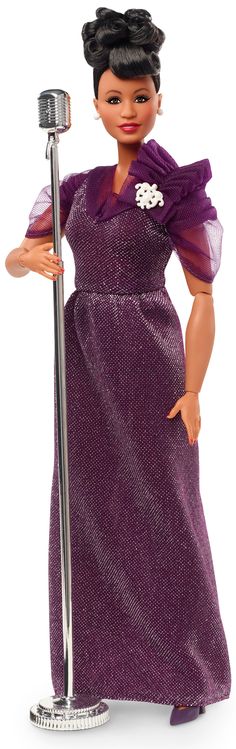 a doll is holding a pole and wearing a purple dress