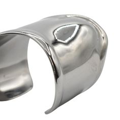 Tiffany & Co. x Elsa Peretti 'Medium Bone Cuff' bracelet in gunmetal tone 925 sterling sivler with an organic asymmetrical design. Brand = Tiffany & Co. Size = Medium Condition = 7.5/10, Very good. Light scratching throughout, faint tarnishing. Material = Sterling silver Dimensions = 61mm SKU = 4450-103 Bone Cuff, Elsa Peretti, Scarf Jewelry, Asymmetrical Design, Sneaker Collection, Men's Collection, Dress With Boots, Tiffany & Co., Loafer Shoes