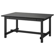 a black table sitting on top of a white floor