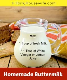 homemade buttermilk mix in a glass pitcher on a wooden table next to bread