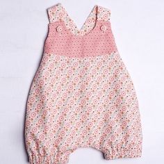 the sewing pattern for a baby's romper