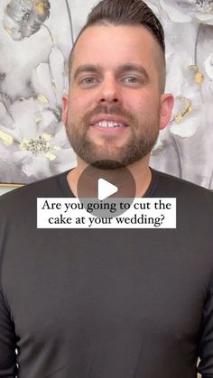 a man standing in front of a flowered wall with the words are you going to cut the cake at your wedding?