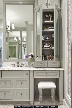 a bathroom with two sinks and a large mirror