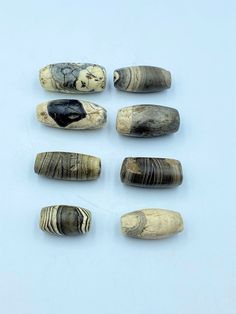 The Lot Of Total 8 Beautiful Banded Agate Old Ancient Jewelry Bead From Central Asia Circa 500 BC . Very unique Strange Collections Of Beads. The Conditions Of Beads Are Clearly Shown In The Pictures . Beads Surface Slightly Damaged . This Agate Was Used As Amulet Beads ,Trade Beads and Jewelry Beads In Ancient Times . From The Conditions Of Agates Beads its Seems Like They Might Burned The Agate In Some Spiritual Occasions Or Might Be Because Of Long Period Of Time . Rare items For Study and Co Luxury Traditional Carved Beads, Colorful Traditional Agate Beads, Traditional 8mm Agate Beads, Handmade Traditional Agate Beads, Traditional Agate Healing Beads, Luxury Vintage Agate Beads, Antique Large Agate Beads, Antique Turquoise, Rare Items