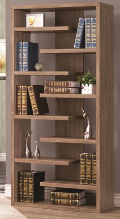 a bookshelf with many books on it in a room next to a window