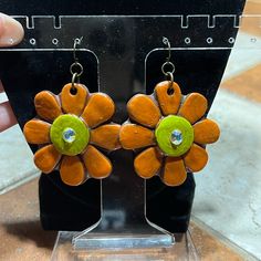 Sookie Sookie Daisy May Earrings. Nwot. Brand New, Never Worn. In Excellent Condition. Brand: Sookie Sookie Color: Orange/Lime Green Hand Pressed And Painted Polymer Clay Handmade And Painted By Sookie Sookie From Carthage Texas Handmade Retro Orange Earrings, Retro Handmade Orange Earrings, Orange Flower Earrings For Gift, Trendy Orange Flower Earrings As Gift, Orange Adjustable Dangle Flower Earrings, Orange Dangle Flower Earrings With Ear Wire, Painted Polymer Clay, Daisy May, Green Hand